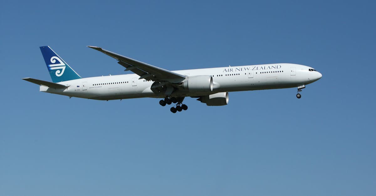 Air New Zealand Boeing 777 cruising at altitude, representing mid-week budget flights New Zealand savings.![image