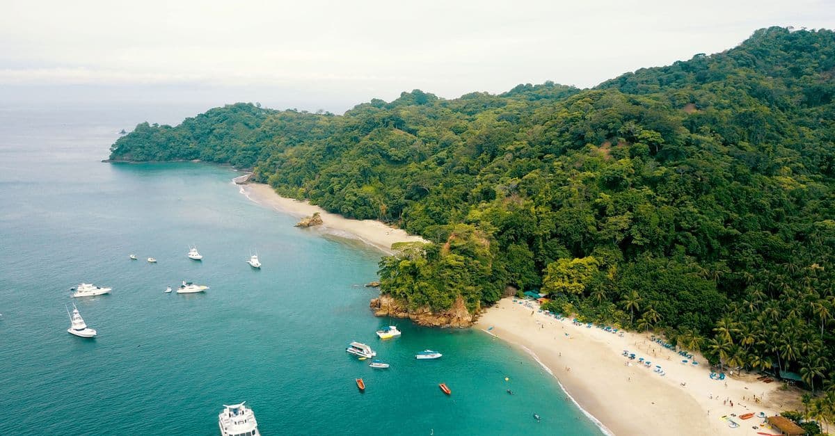 Canadian travellers enjoying a costa rica all inclusive resort on a secluded tropical beach.