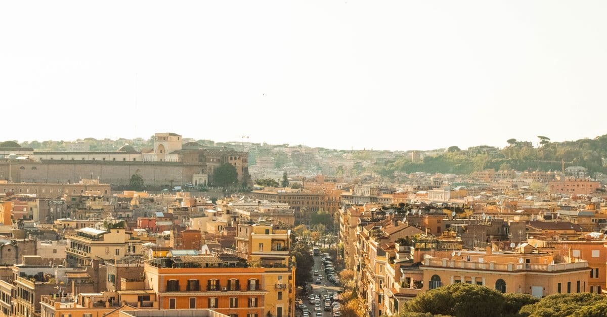Aerial panorama of Rome's historic rooftops and monuments, perfect for exploring beyond the tourist trail