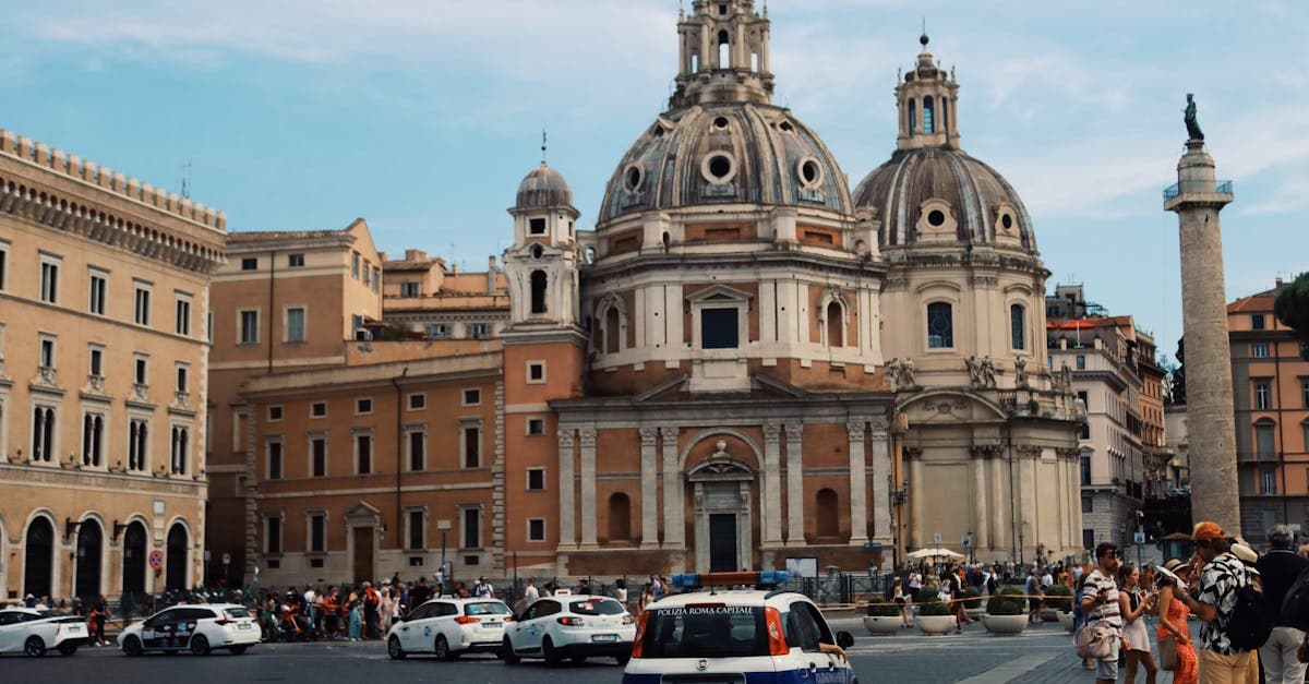 Santa Maria di Loreto church and Trajan's Column in central Rome, key landmarks to navigate on your food tour