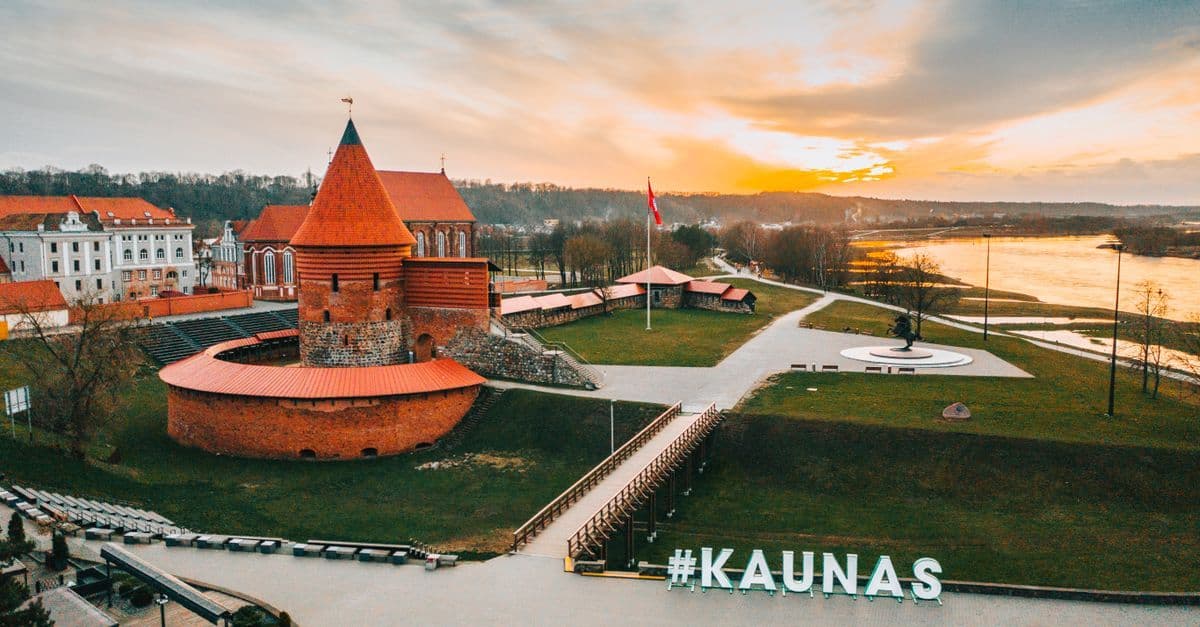 Aerial golden hour view of Kaunas Castle skyline, highlighting lithuania in europe's rich medieval heritage