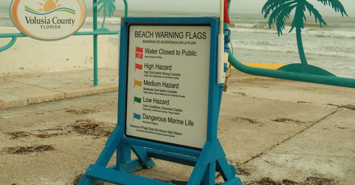 Beach warning flags in Volusia County Florida alerting swimmers to hazardous conditions during storms.