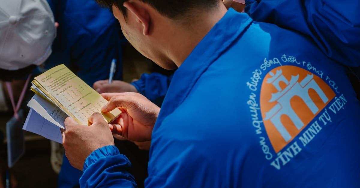 Traveller reading paperwork outlining the documents required during the vietnam visa for australian eVisa submission process.