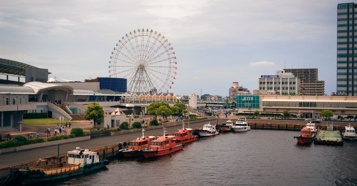 Toàn cảnh cảng Nagoya với vòng đu quay và thuyền bè - địa điểm tổ chức ASIAD 2026