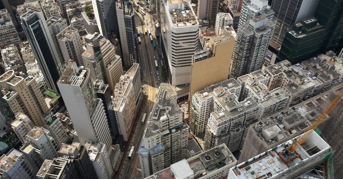Bird's-eye view of Hong Kong Island's towering skyscrapers, the hallmark density that sets central business districts apart