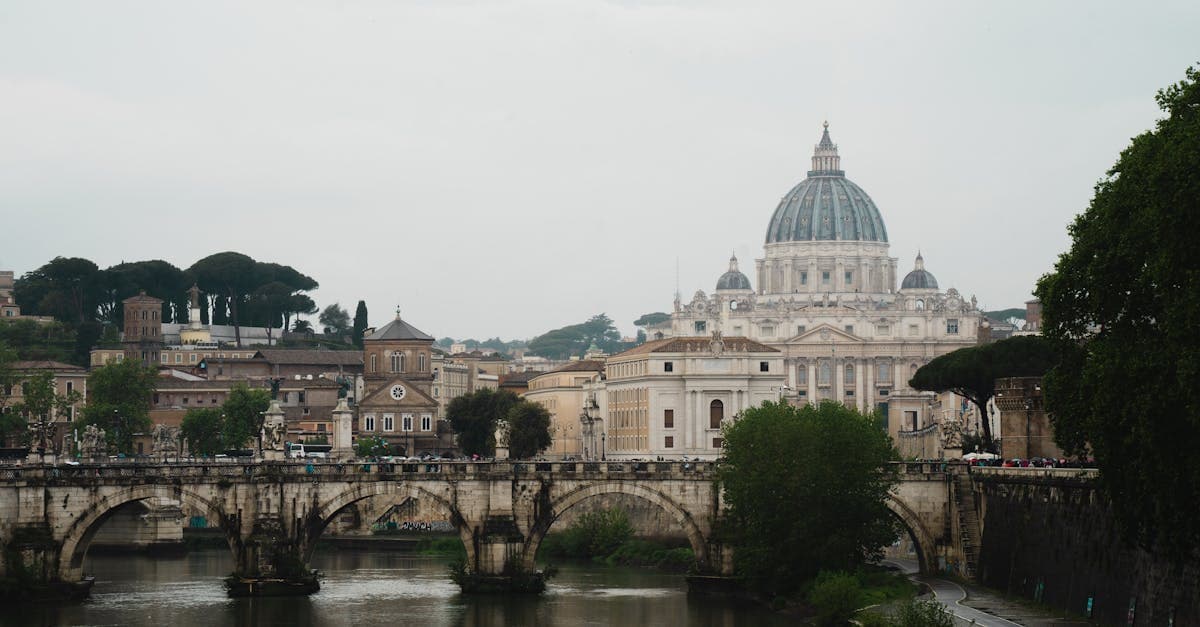St Peter's Basilica and the River Tiber at dusk, among the unmissable things to do in Rome
