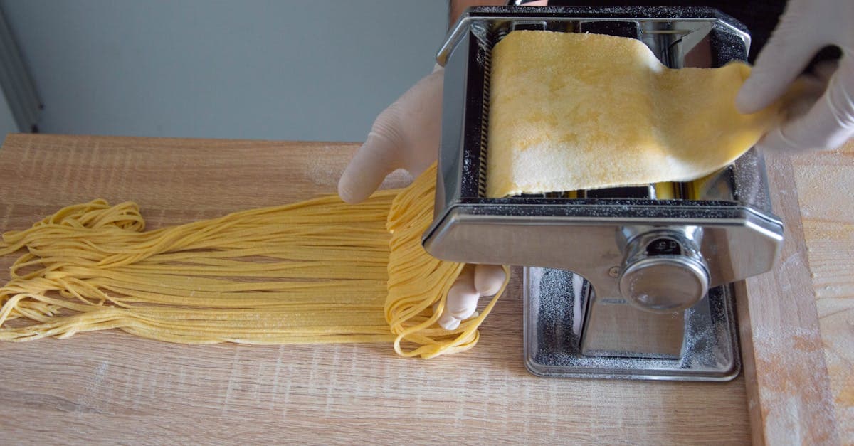 Roman pasta maker crafting fresh spaghetti in Testaccio, Rome's most authentic neighborhood for a food tour rome