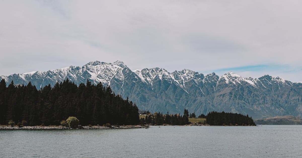 Lake Wakatipu reflecting the Remarkables mountain range in Queenstown, essential travel to New Zealand destination in 2026.