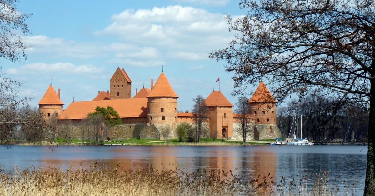 Trakai Island Castle mirrored in serene lake waters, embodying lithuania in europe's Grand Duchy legacy