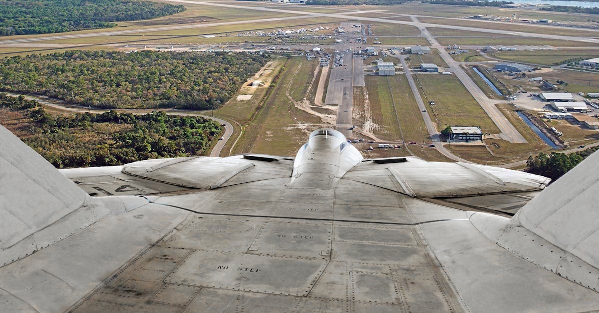 Aerial view of aircraft approaching a regional airport, representing diverse trip types and travel eSIM data needs
