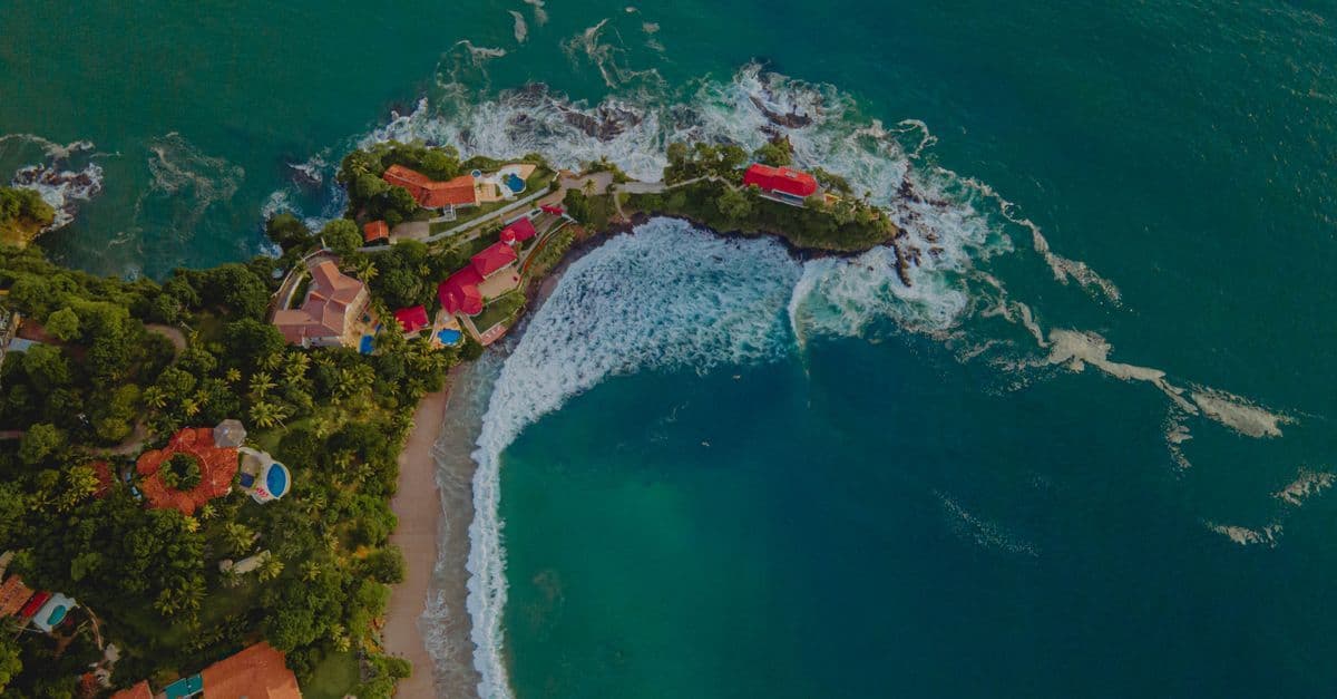 Turquoise waters and white sands of Playa Flamingo, a top Guanacaste costa rica all inclusive destination.