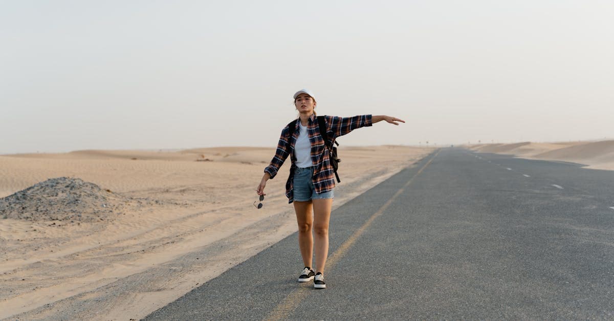Woman holding a map while exploring the scenic California desert, discovering underrated solo travel destinations.
Riga gets a fraction of the US visitors that Prague or Tallinn do, despite matching both on walkable medieval streets and beating both on price. The old town has a strong safety record, and a budget traveller can eat and sleep well for roughly half what the same day costs in Lisbon.
Corfu sits at a natural intersection: ferry routes from Brindisi or Ancona make it a logical multi-country stop, the beaches are genuinely excellent, and the Byzantine interior is almost entirely tourist-free. Safer than the mainland party circuit by a clear margin.
Medellín and Bogotá have spent a decade building a measurably improved safety record [talesofabackpacker.com. Both cities have dense communities of women travelling solo, which makes finding day-trip companions easy. Skip the airport SIM kiosk in either city; phone theft in crowded arrivals halls is documented, and an eSIM activated before landing eliminates that exposure.
Maun, Botswana is the gateway to the Okavango Delta without East Africa's mass-tourism crowds, backed by infrastructure that's reliable by southern African standards.
Morocco's medinas reward modest dress with a noticeably lower harassment rate. In Marrakech's souks, pickpocketing is documented; an eSIM activated before landing means you're never exposing your phone at a market SIM kiosk.
Abu Dhabi ranks among the lowest-crime cities globally by crime index. Research local dress codes and public behaviour expectations before arrival.
How to Plan Your First Solo Trip as a Woman
![Young woman with backpack hitchhiking solo on an open desert road across the American Southwest