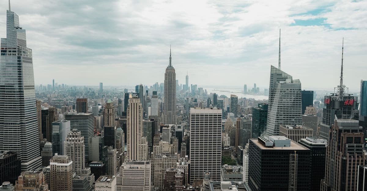 Aerial view of New York City's skyline capturing the distinct towers of Midtown Manhattan and the Financial District