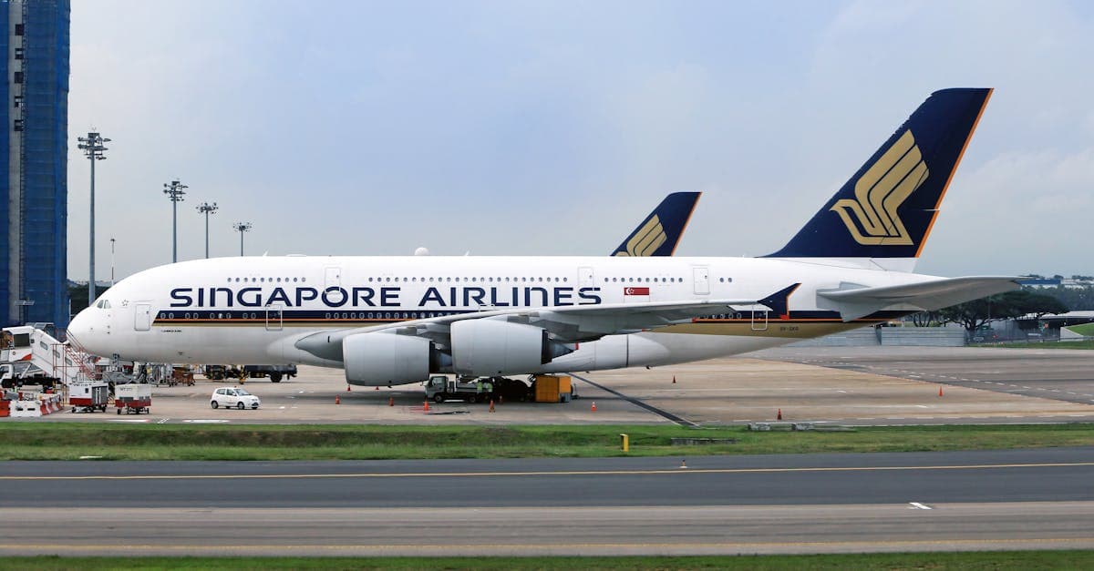 Singapore Airlines Airbus A380 at airport terminal, a popular aircraft on the Sydney to Singapore route.