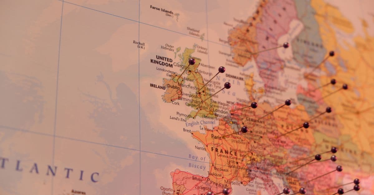 Detailed map of Europe with coloured push pins marking countries including Ireland and the UK