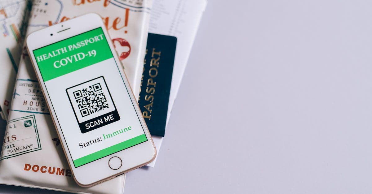UK passport and travel documents alongside a smartphone, highlighting the choice to renew passport online or by post