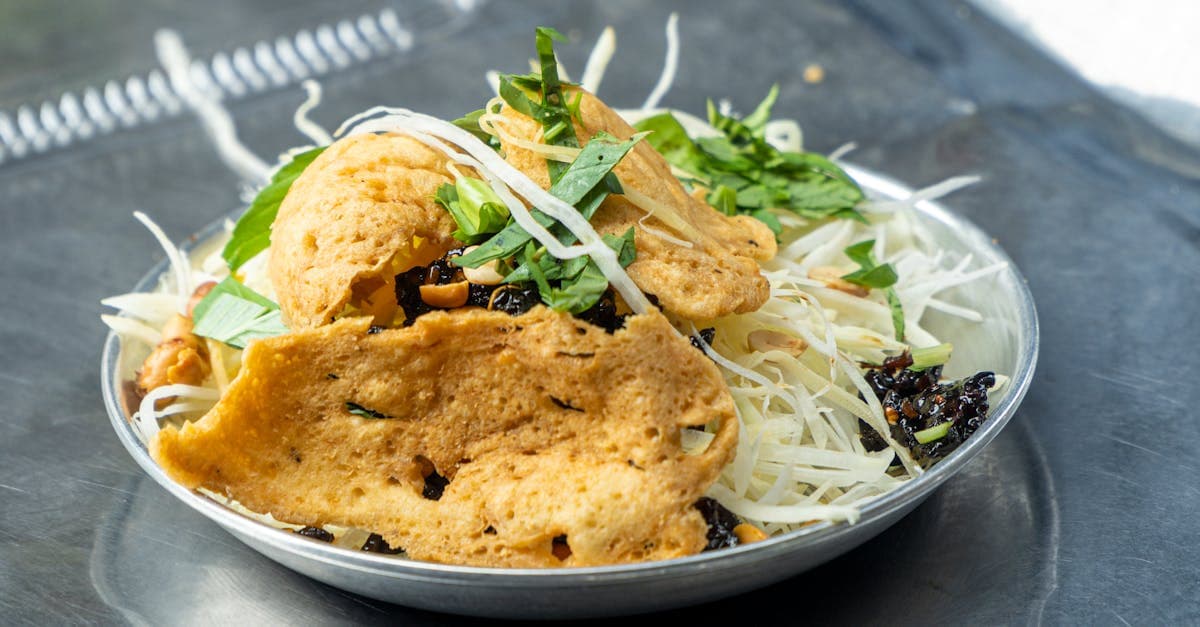 Vietnamese rice paper salad with fresh greens and crispy toppings, a popular vegetarian street food