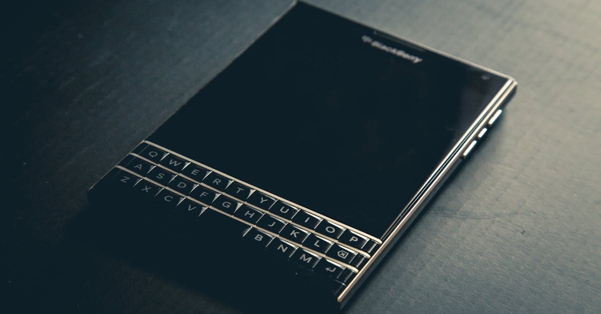 Close-up of a BlackBerry Passport with a physical QWERTY keyboard, representing iconic smartphone hardware design.