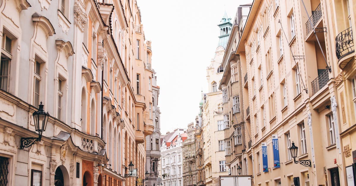 Bustling historic European street with locals walking and architectural landmarks surrounding Canadian travelers