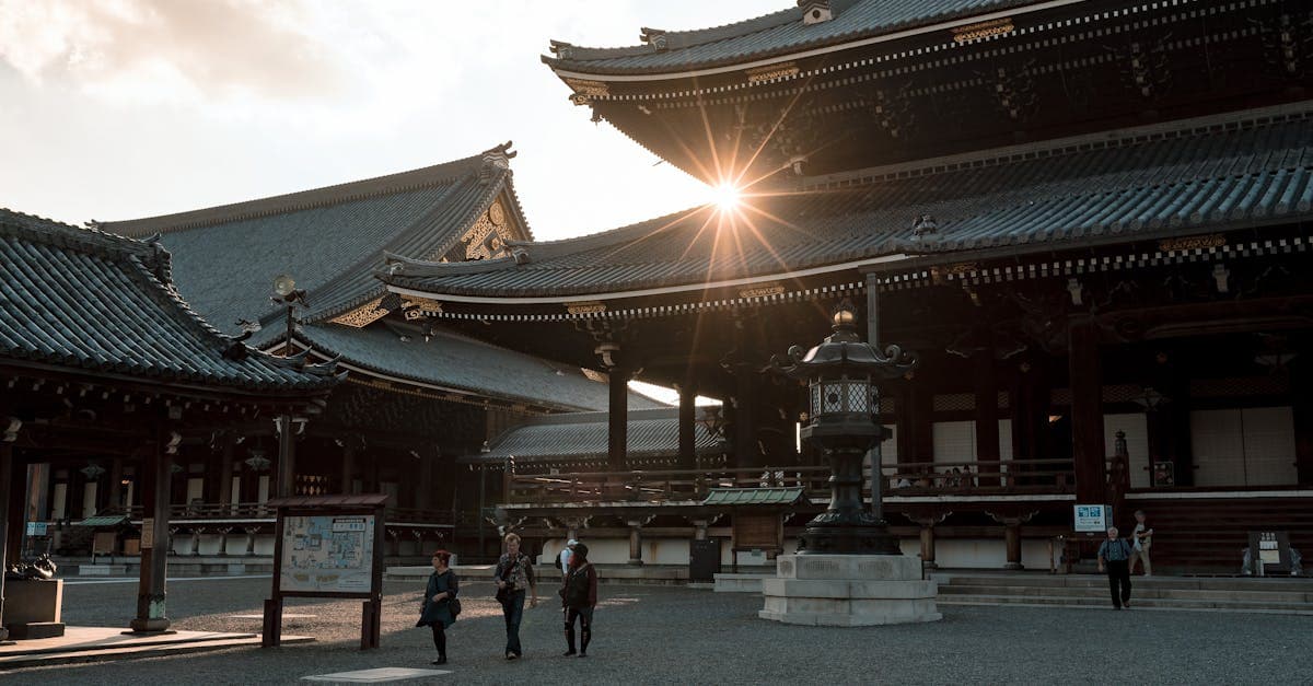 Kyoto temple architecture glowing at sunset, reflecting the best time to visit Japan for Singapore travellers on a budget.