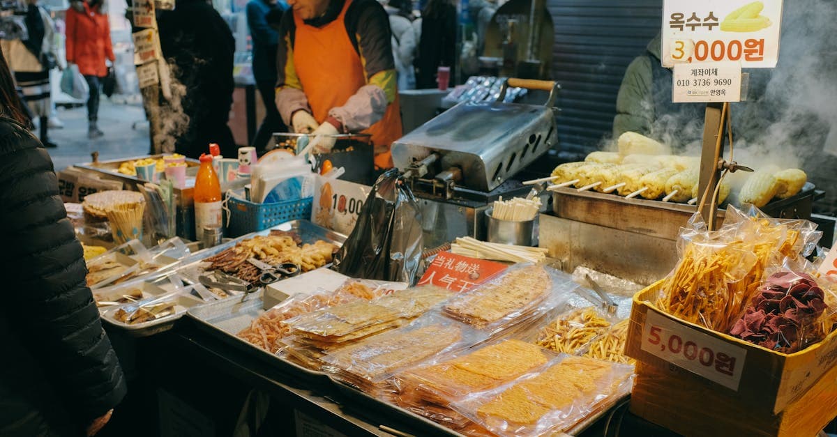 Korean street food selection featuring sweet hotteok, fish cakes, and colourful traditional market confections.
