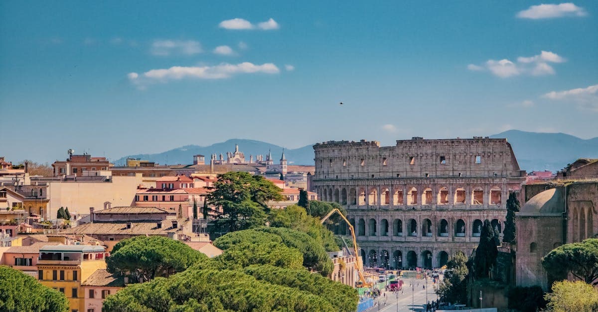 The Colosseum standing tall on a sunny day, one of the top things to do in Rome