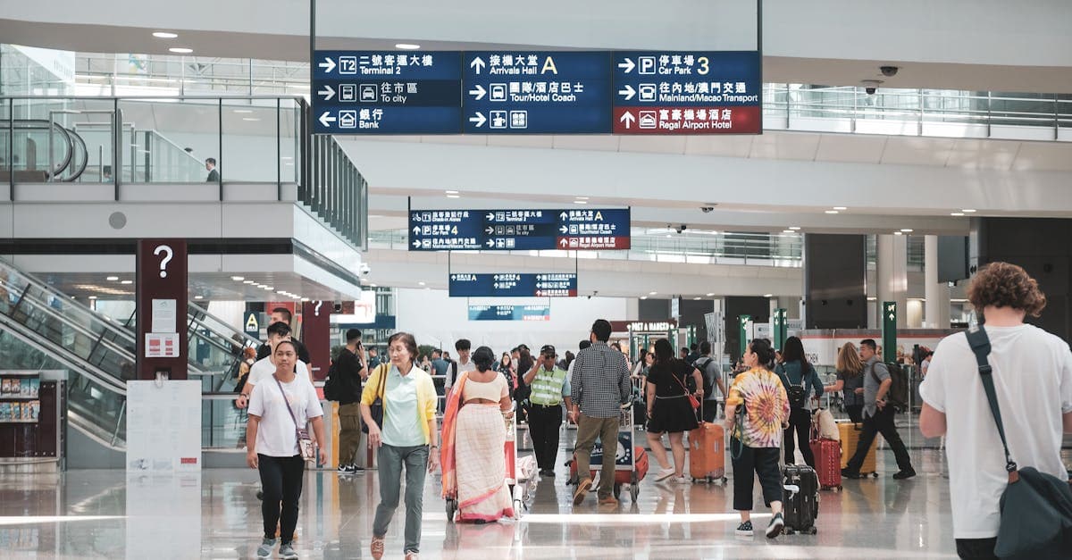 Crowded airport terminal full of departing passengers, capturing the busy reality of international roaming travel.