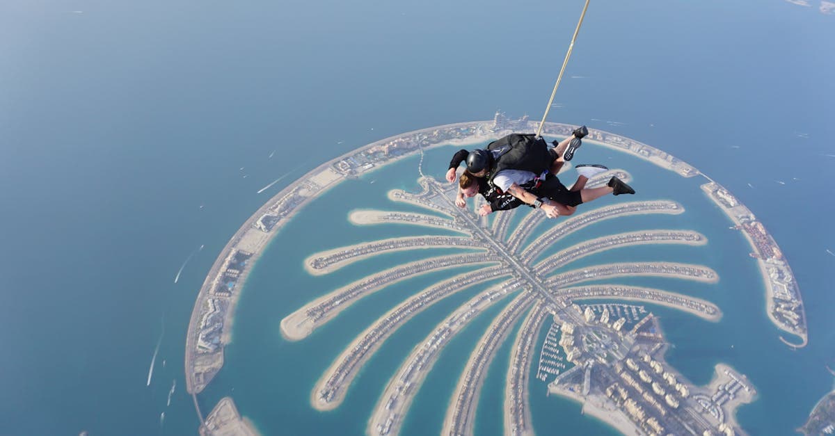 Skydiving over Palm Jumeirah with aerial views of Dubai's coastline, a bucket-list thing to do in Dubai