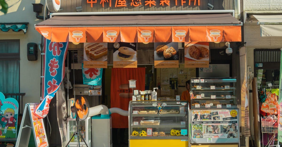 Traditional street food stall in Kyoto offering local delicacies, a top culinary thing to do in Japan