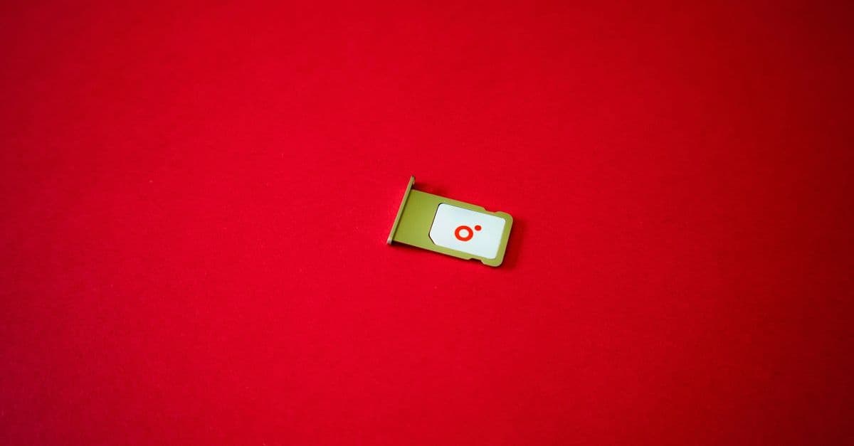 SIM card tray on a vivid red background, representing affordable O2 SIM only deals for UK users.