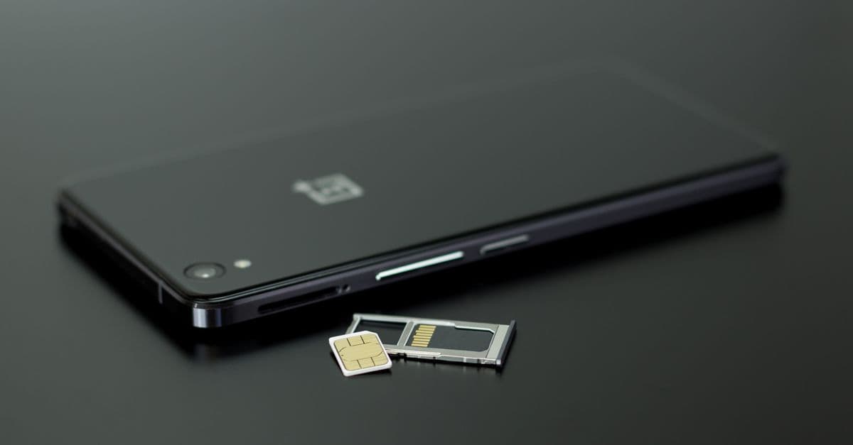 Smartphone displaying a travel eSIM setup, ideal for staying connected in Bali after securing your visa.