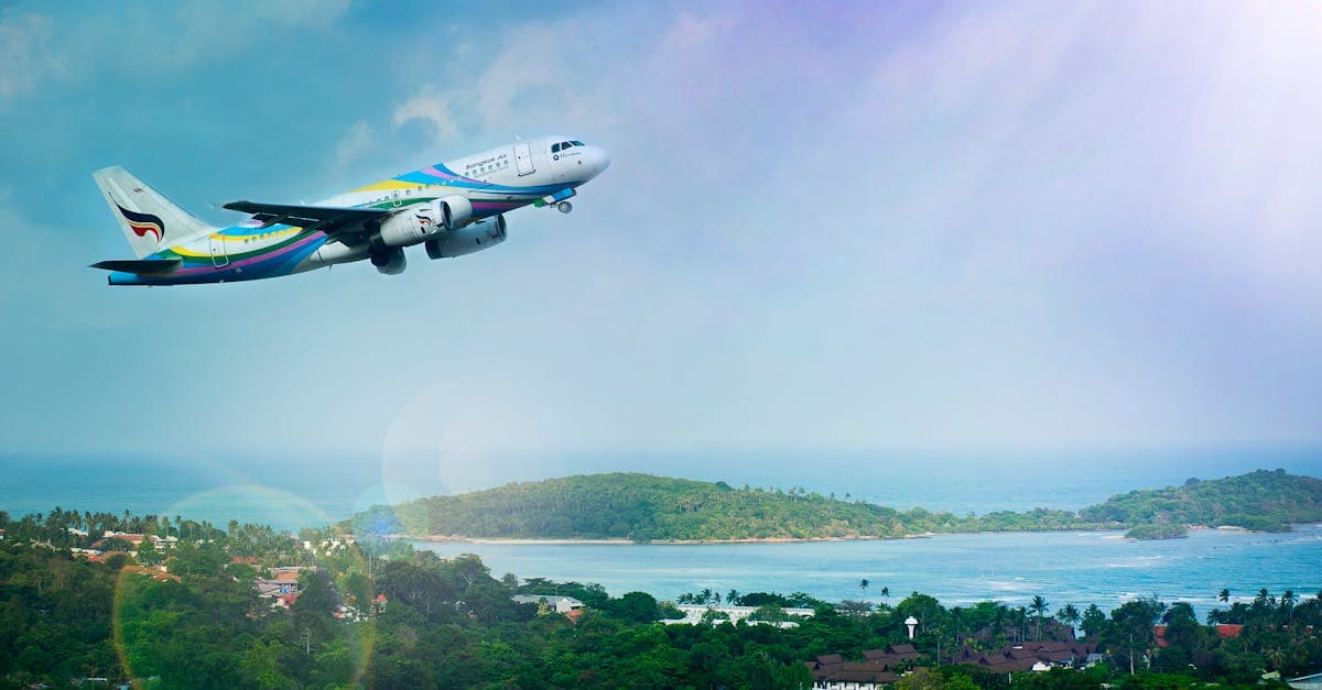 Airplane soaring over tropical Koh Samui as travellers weigh the disadvantages of using an esim thailand