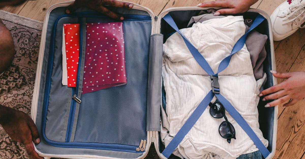 Neatly organised open suitcase showing the carry-on essentials that belong on every packing list for holiday