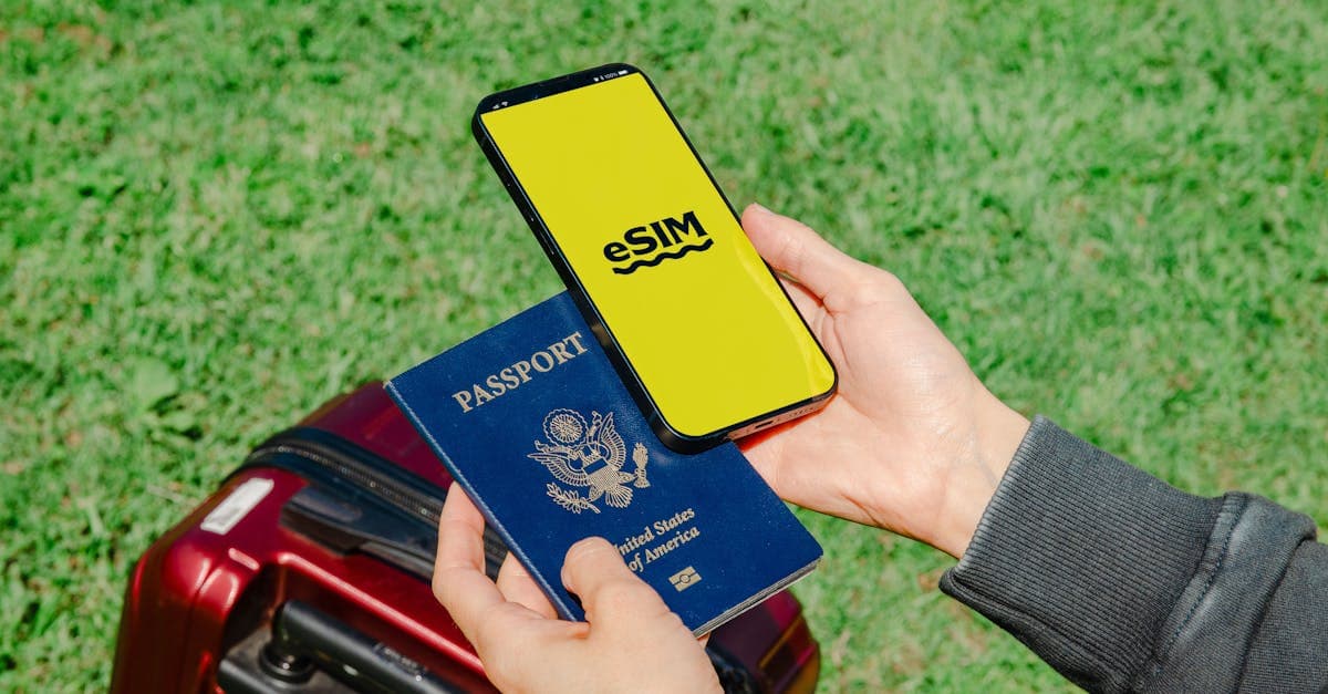 Traveller holding smartphone and passport beside luggage, deciding between eSIM and local SIM for NZ.![image