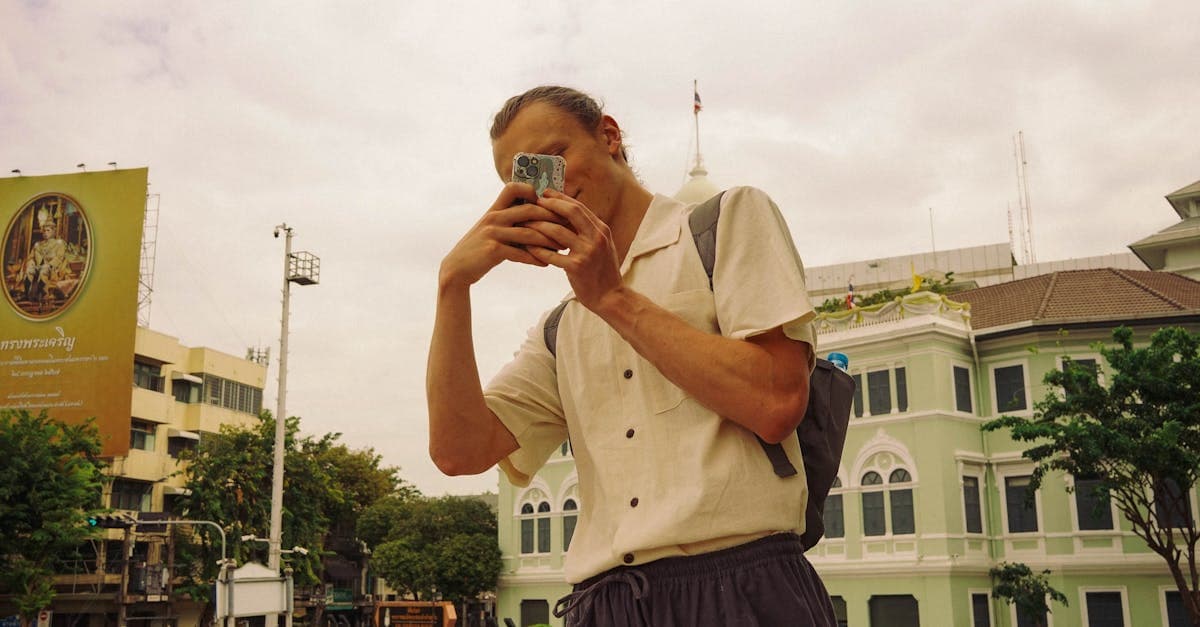 Traveller capturing Bangkok's bustling street scenes while staying connected during a Thailand holiday.