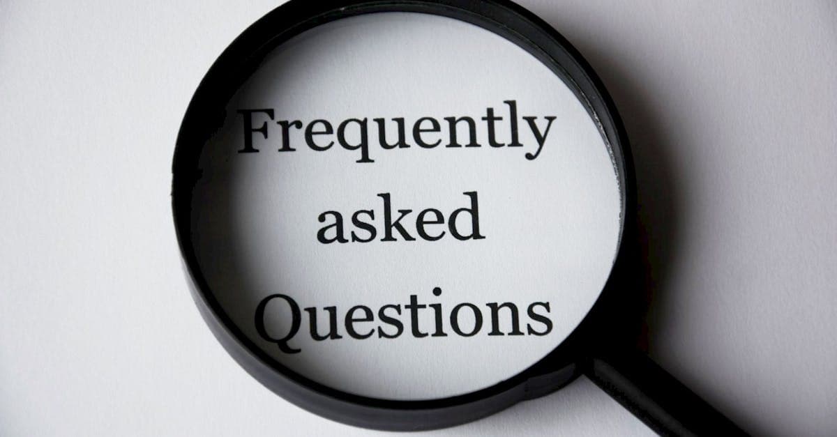Magnifying glass focused on the words Frequently Asked Questions about the us visa appointment process