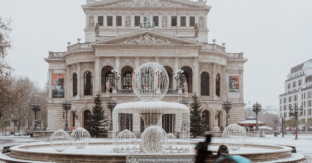 A winter view of the Alte Oper in Frankfurt with snow and illuminated fountains.
Quick Answer: best europe cities to visit in december
![Frankfurt's snow-covered Alte Oper with illuminated fountains, among the best europe cities to visit in december