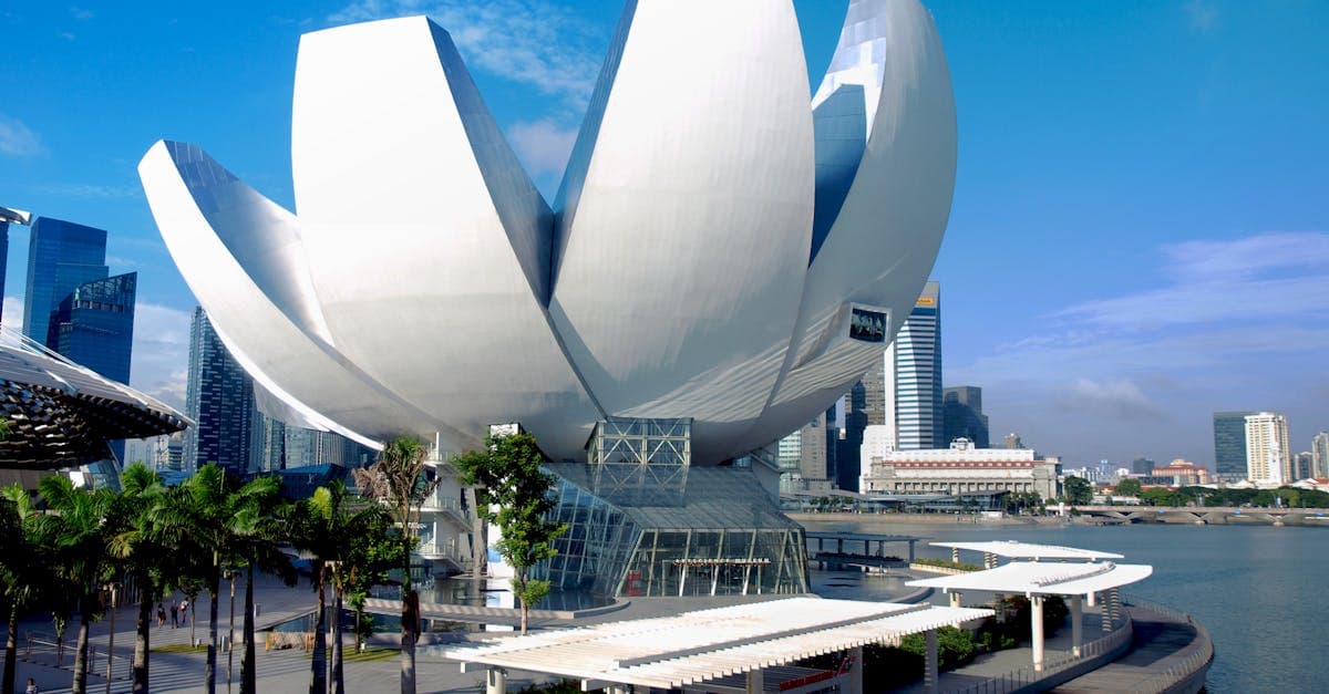 ArtScience Museum under clear Singapore skies — buying a singapore tourist sim card saves money over roaming