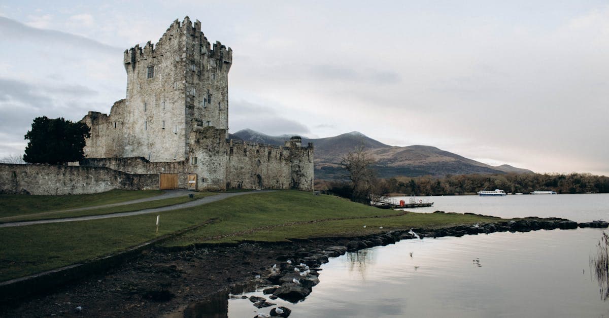 Historic Ross Castle beside Lough Leane in Killarney, essential sight to know before visiting Ireland