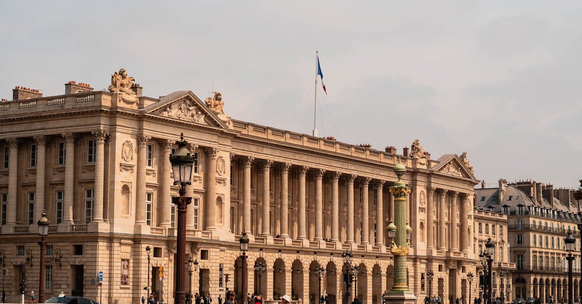 Hôtel de la Marine's grand Parisian architecture under clear skies, a top attraction during cheaper off-season travel months
