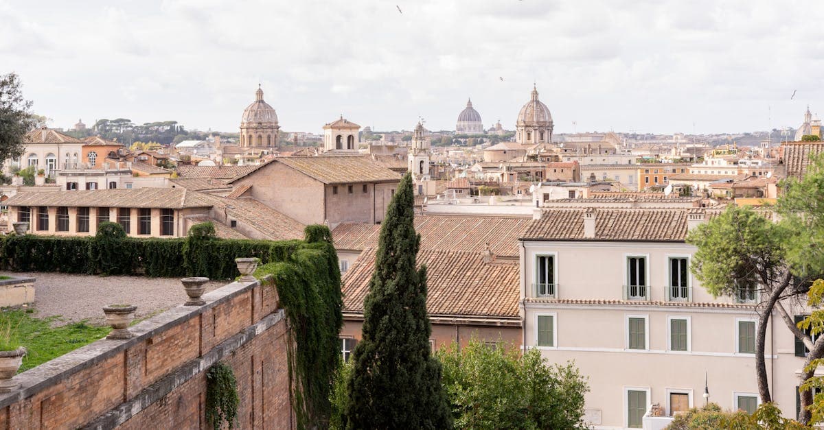 Rome's historic skyline dotted with terracotta domes and rooftops, revealing hidden things to do in Rome