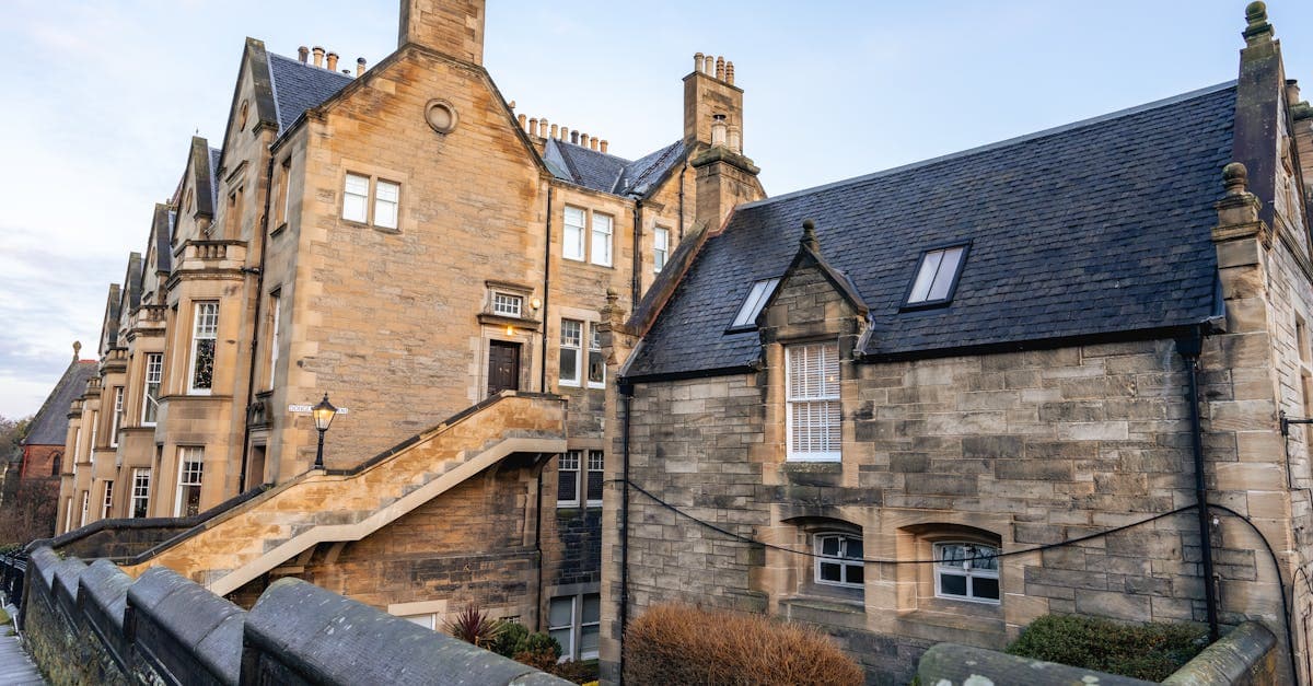 Historic Gothic stone buildings in Edinburgh representing UK travellers facing high Europe roaming charges.