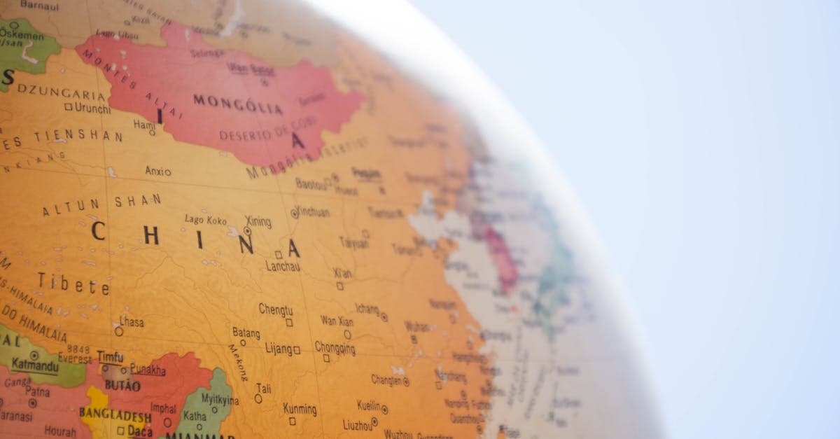 Budget travel cost comparison across cheapest countries to visit from India displayed on a world globe