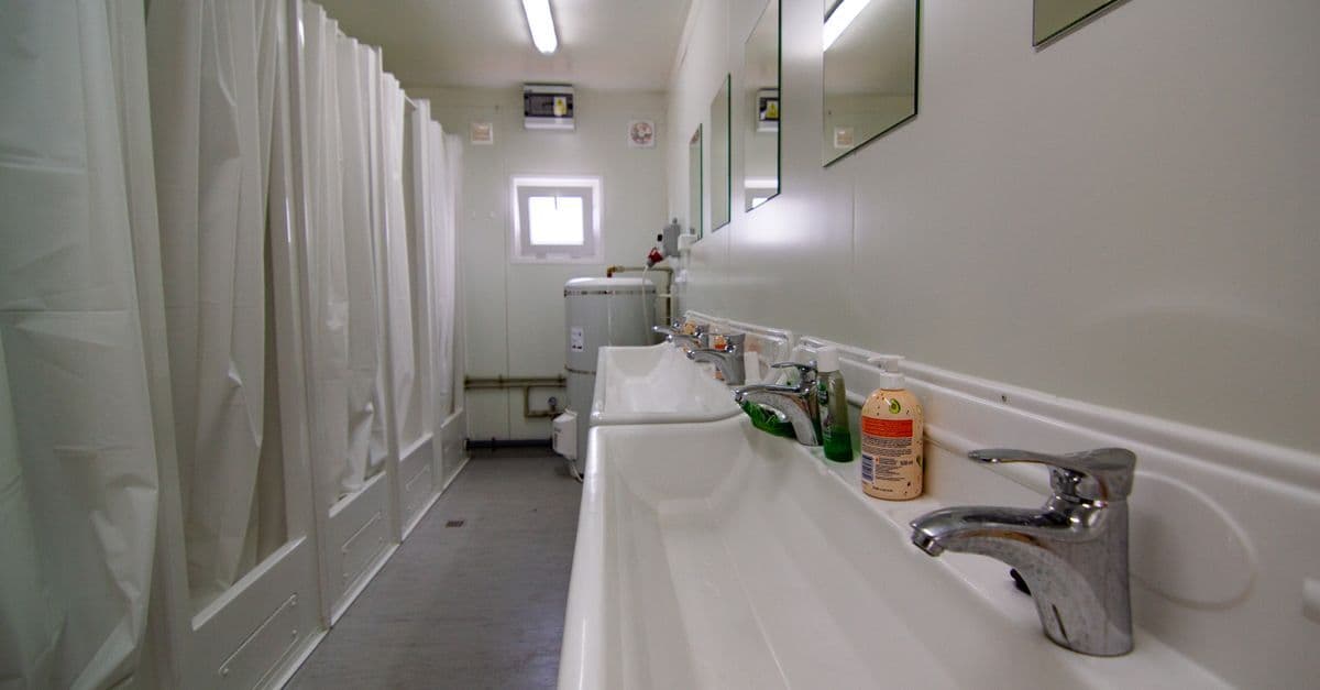 Clean, modern shower facilities available for truckers and travelers at a Petro Travel Center.