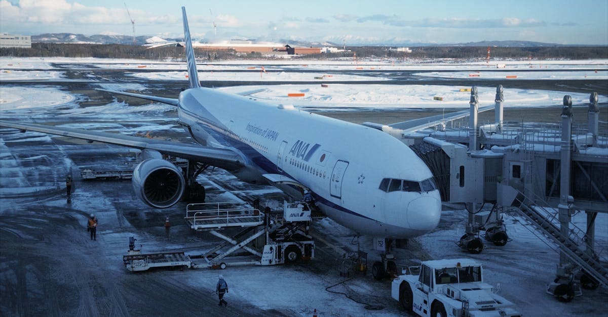 Snow-covered New Chitose Airport in Hokkaido, a key arrival point for UK travellers visiting Japan in winter.