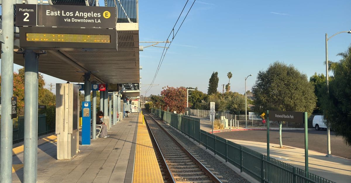 Sunset over East Los Angeles train station platform, a key transit hub for Australian visitors travelling to the Olympics.