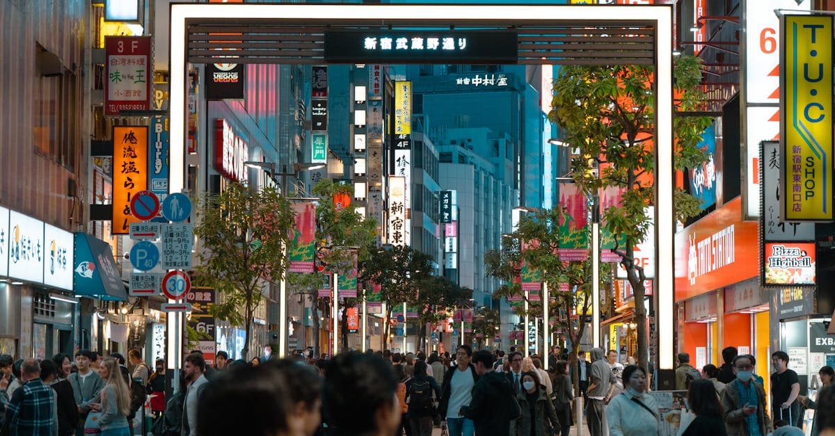 Neon-lit streets of Shinjuku at night, showcasing budget-friendly things to do in Tokyo for UK travellers