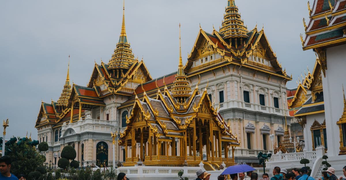 Western tourists at Bangkok's magnificent Grand Palace discovering why Thai time confuses English-speaking visitors