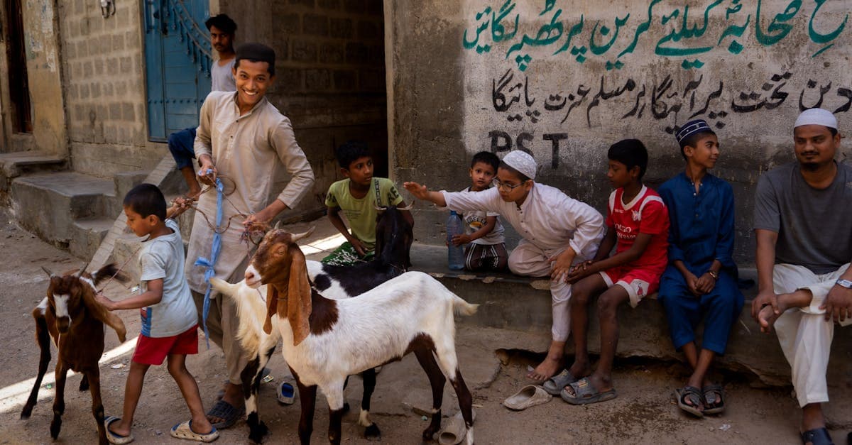 Joyful children with goats on a lively street in Karachi, Pakistan.