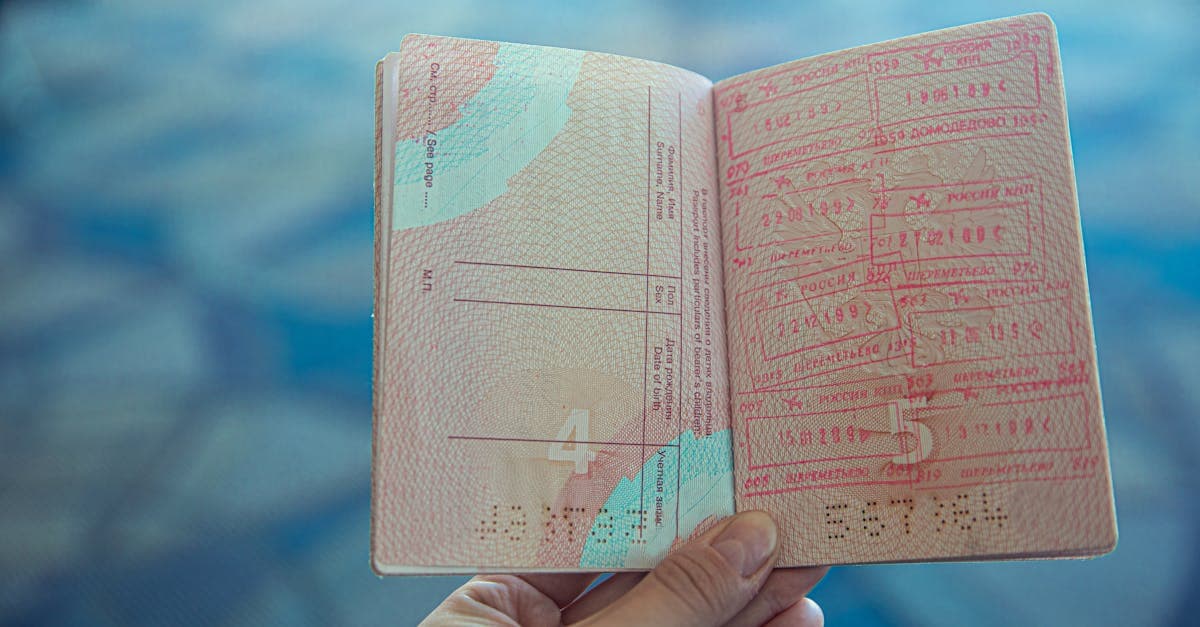 Open passport showing travel stamps, essential document for your digital travel eSIM visa spain application